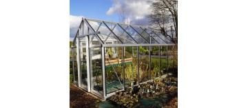 Janssens Eos Junior 10,80m² kas in natuurlijk aluminium en gehard glas met voet