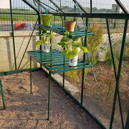 Groen gelakte aluminium opvouwbare tafel en plank met bloemen