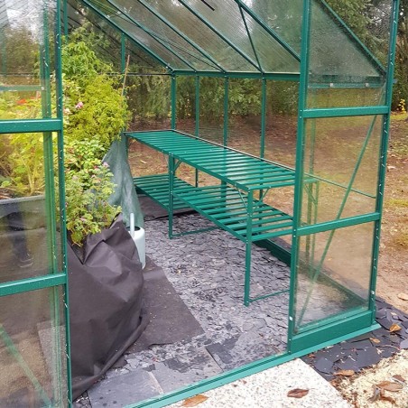 Tafel met twee groen gelakte aluminium bladen
in de kas